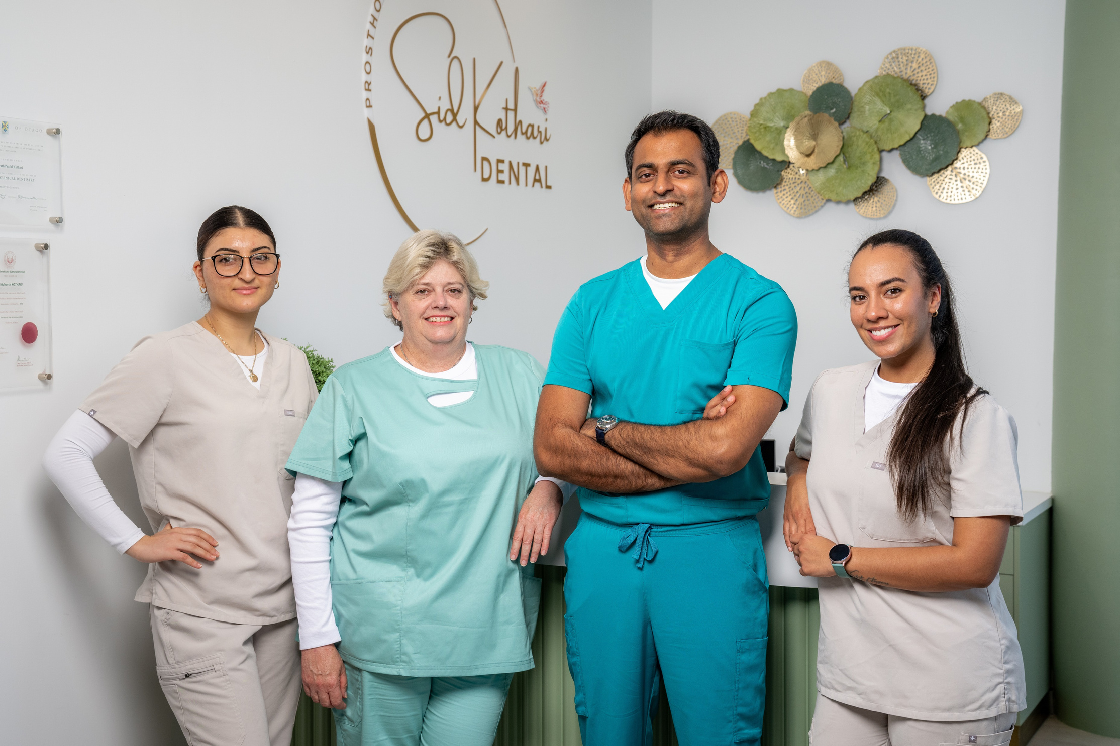 From left to right: Georgina, Dental Assistant; Tracey, Receptionist; Dr Sid, Prosthodontist; Natalia, Dental Assistant.